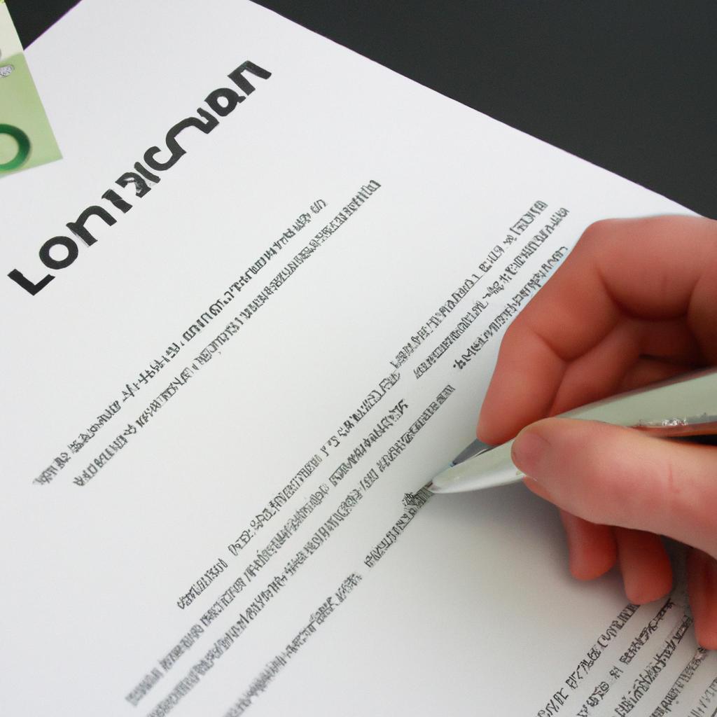 Person signing loan repayment document